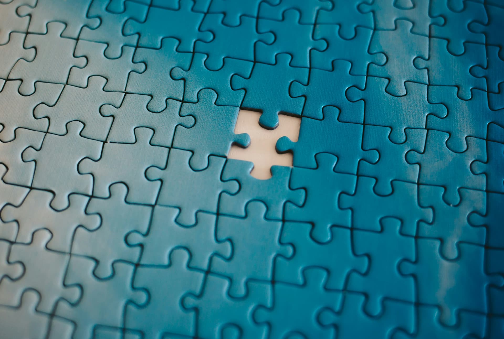 Puzzle pieces fitting together, representing collaboration